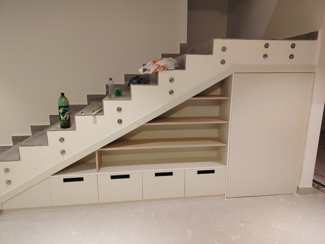 Custom kitchen with floor-to-ceiling storage units and appliance housing, Prime Finish