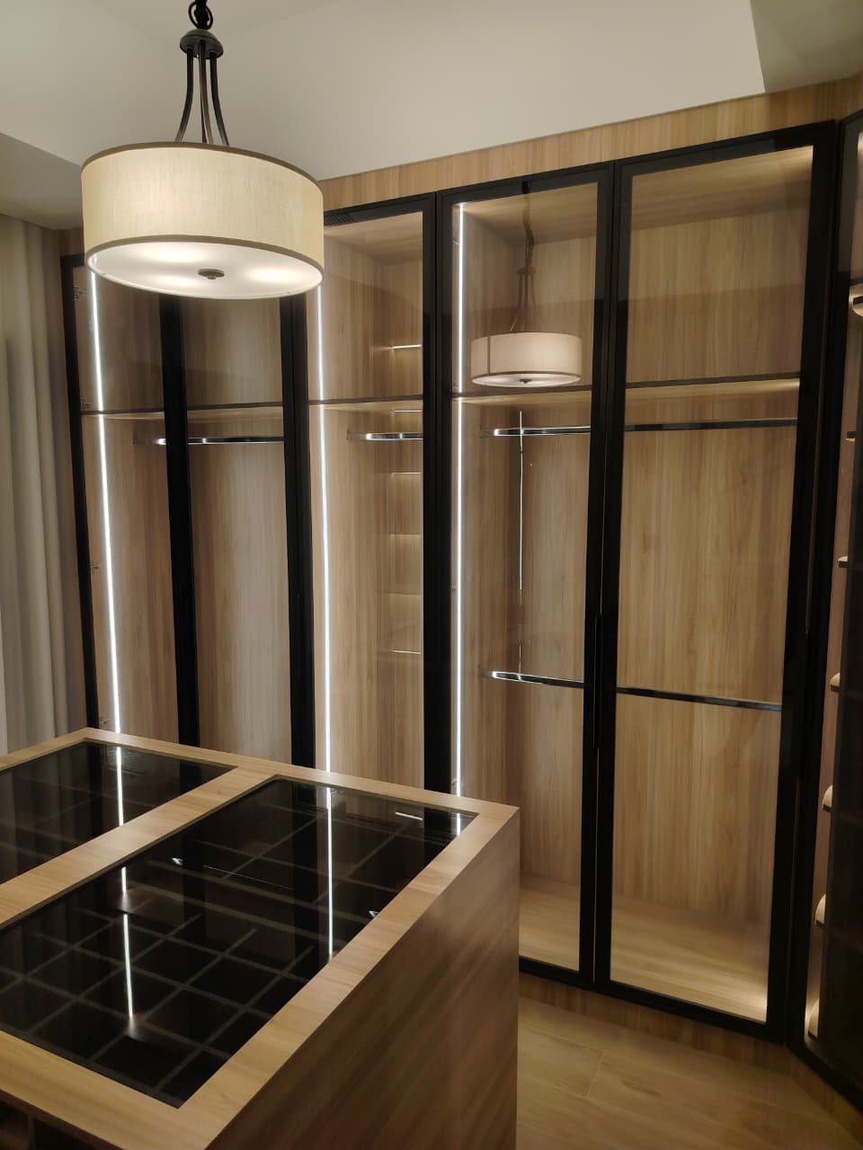 Custom wardrobe with integrated LED lighting and soft-close hinges, Prime Finish